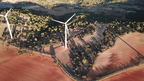 Aerial View of a Field of Wind Generators During Sunset Near Madrid. Spain in the Fall