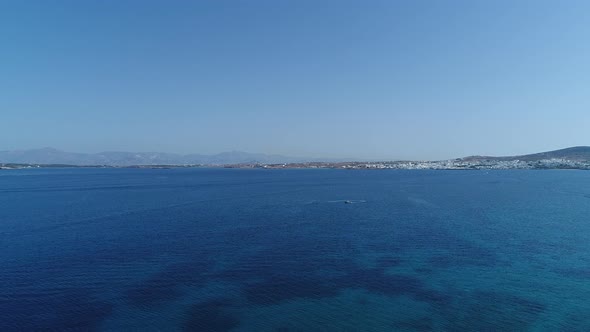 Piperi beach in Naoussa on Paros island in the Cyclades in Greece aerial view alt