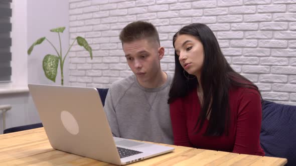 Sad Serious Couple Talking By Video Call Use Laptop Tell Bad News