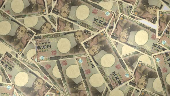 10000 Japanese yen bills background. Many banknotes. alt