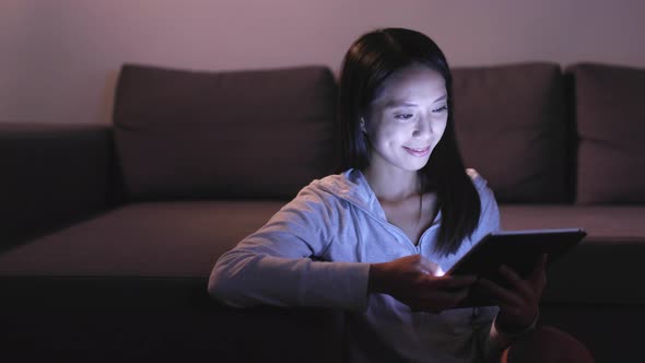 Woman Use of Digital Tablet at Home 