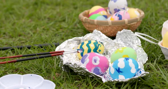 Colorful Easter holiday egg at outdoor alt