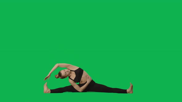 Young Woman in Sportswear Doing Yoga Stretching the Body alt