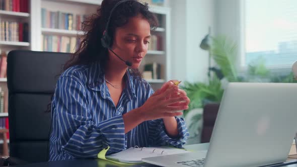 Indian Support Service Female Worker Sitting at Workplace with Laptop in Office alt
