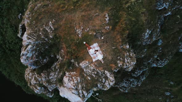 Romantic Picnic Outdoors with Plaid on the Mountain