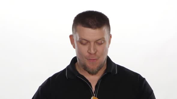 Man Eats a Hamburger. White alt