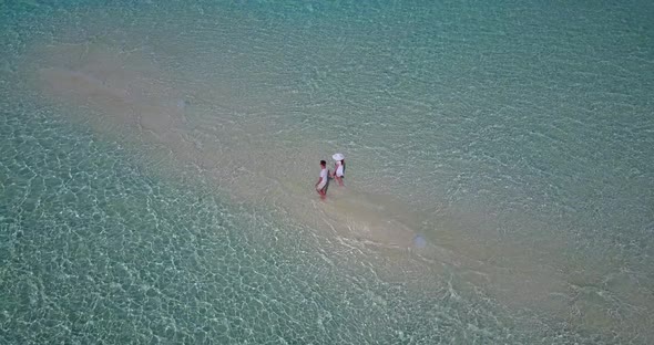 Happy people in love dating on vacation enjoy life on beach on white sand background  alt
