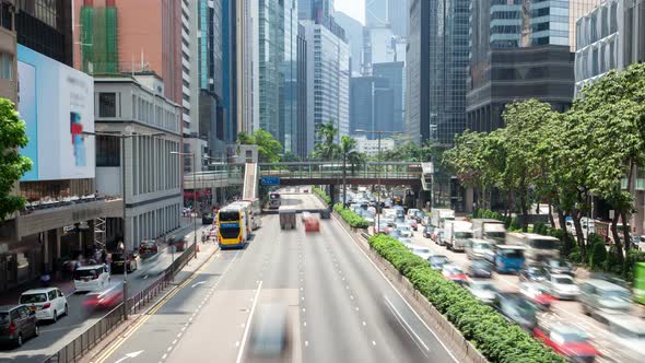 Timelapse Cars Drive Along Wide Hong Kong Street Highway alt