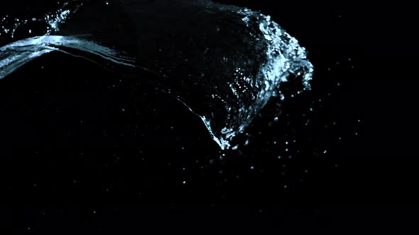 Super Slow Motion Shot of Water Splash Against Black at 1000Fps alt