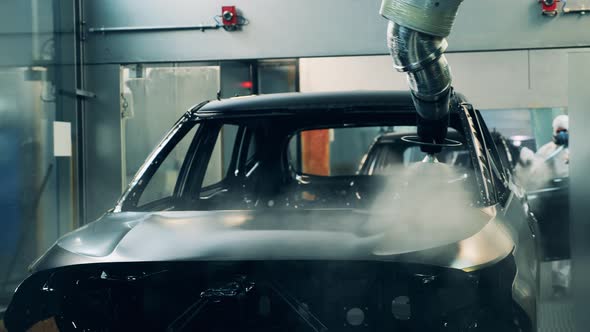 Body of an Unfinished Car Is Being Galvanized. Automobile Factory, Car Production, Auto Production alt