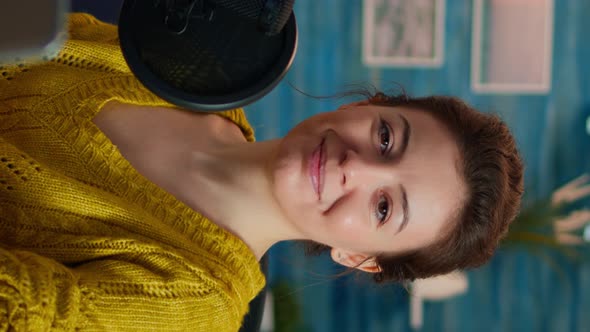 Vertical Video Portrait of Vlogger Looking at Camera Before Starting Live Video Vlog alt