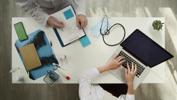 Doctors Working Together Top View alt