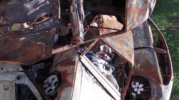 Vertical Video of Burned Cars During the War in Irpin Ukraine alt