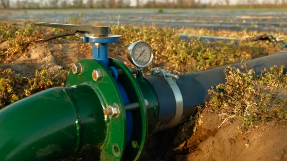 Irrigation Pipe System with Water Meter on Large Field