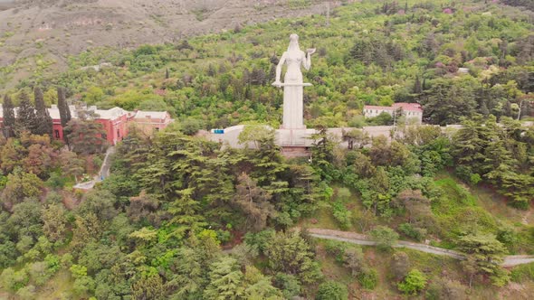Aerial Approaching View Of Mother Of Georgia Statue alt