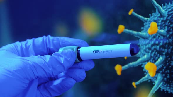 Hand Holding Beaker with Coronavirus Blood Test alt