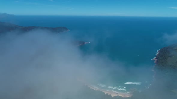 Foggy morning at Paraty beach travel destination in Brazil. alt
