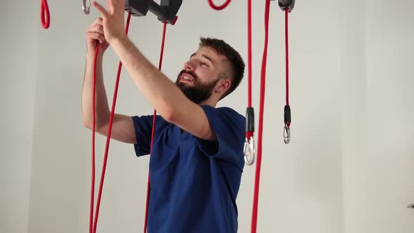 Manual Therapy Preparation of Device for Treatment Procedure Clinging Hooks alt