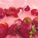 Splashes of water fall on strawberries. Slow motion. - VideoHive Item for Sale