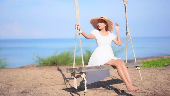 Asian woman enjoy around beautiful beach sea ocean alt
