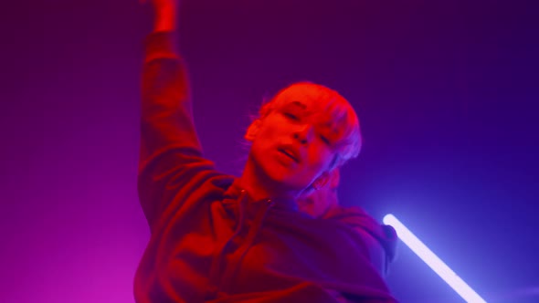 Dancers Couple Performing Hiphop on Nightclub Stage alt