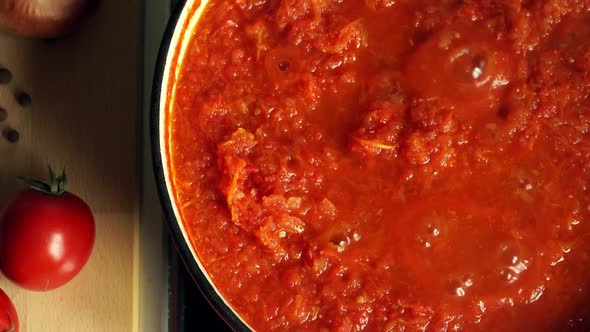 Saucepan on Stove with Boiling Hot Tomato Sauce