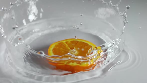 Slice of Orange and Water Spray