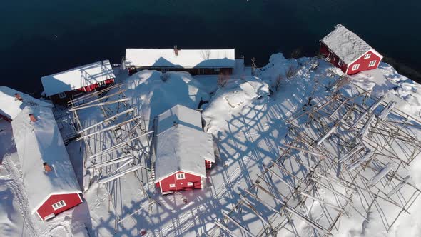 Bay of Reine in the Lofoten islands (Norway) Fishing village under a sunny blue sky.