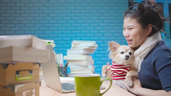 young attractive asian female hand use laptop video call communication alt