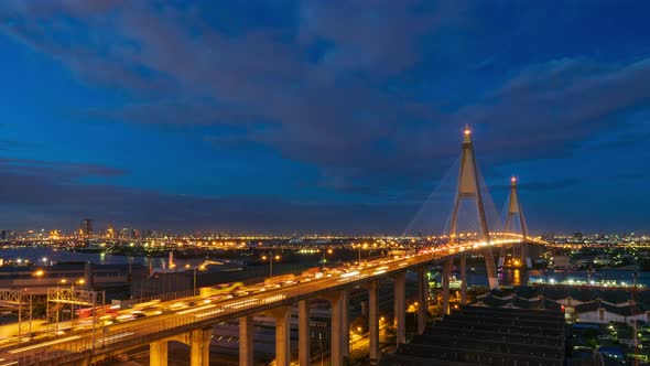 Large suspension bridge over Chao Phraya, during night, day to night - Time Lapse