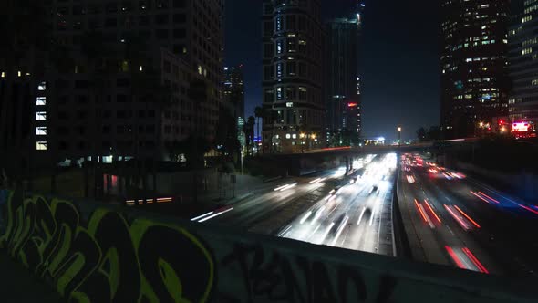Night Traffic Past Graffiti Wall