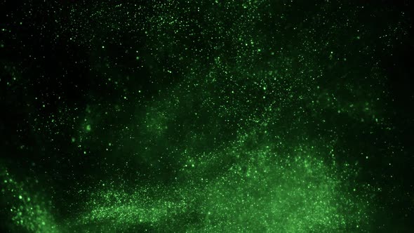 The Explosion of Green Particles on a Black Background by Puzurin |  VideoHive