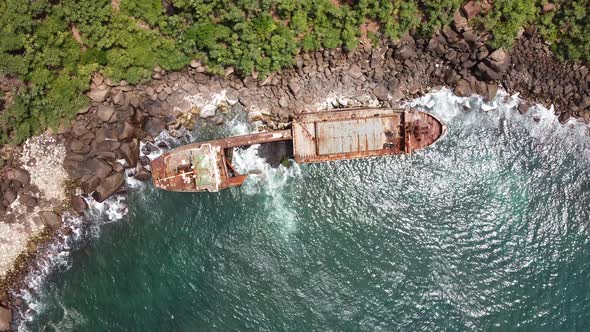 The Rusty Shipwreck Run Aground. Sri Lanka