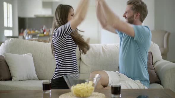 Soccer Fan Couple Watching Tv at Home