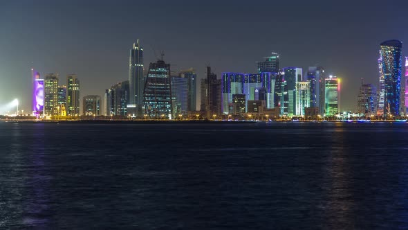 Doha Skyscrapers in Downtown Skyline Night Timelapse Qatar Middle East alt