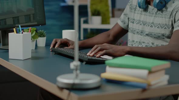 Close Up of Architect Using Keyboard and Computer alt