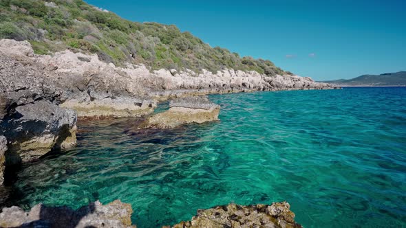 Panoramic View of Clear Turcuoise Water of Mediterranean Sea at Rocky Coast in Marmaris Turkey alt