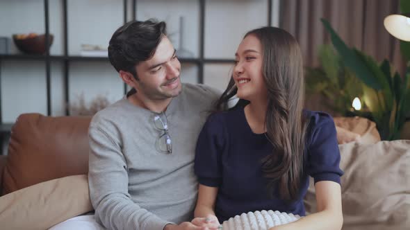 home finance,husband and wife discussing paper bill receipt together alt
