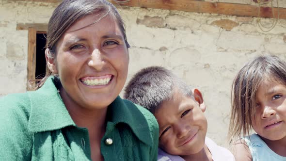 Young Woman and Children in Rural Mexico Smiling