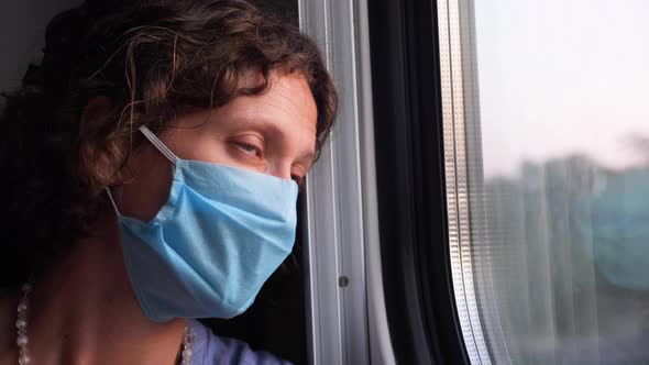 Caucasian Woman Wears Protective Face Mask. Face in Protective Medical Mask. Passenger in Surgical