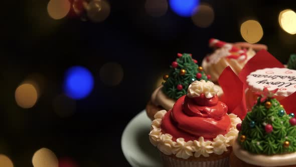 Cupcakes on Christmas Tree Background