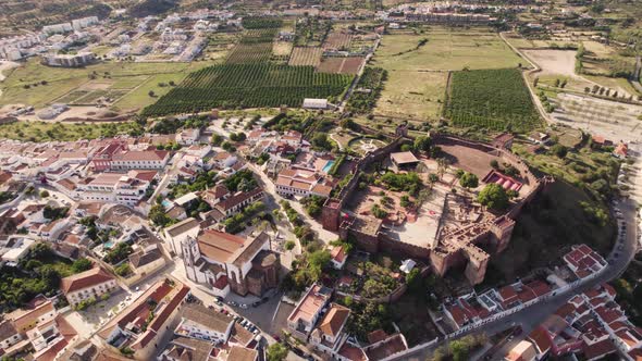 Old town and castle of  Silves. Fortified red sandstone walled city in Algarve, Portugal. alt