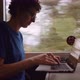 Woman in Glasses Working on a Laptop While Going By Train - VideoHive Item for Sale