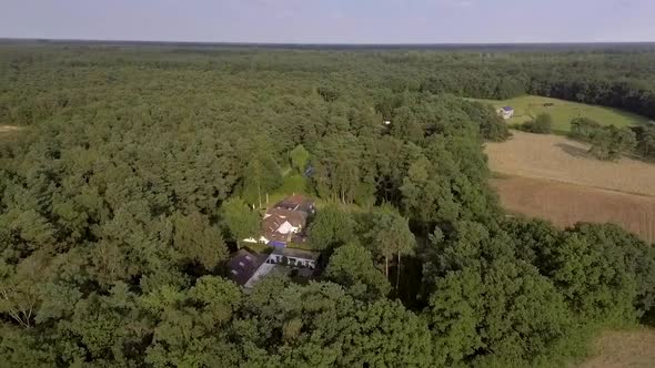 A drone flight over the Kempen forest and village in Belgium near to Antwerp. A drone flight over a alt