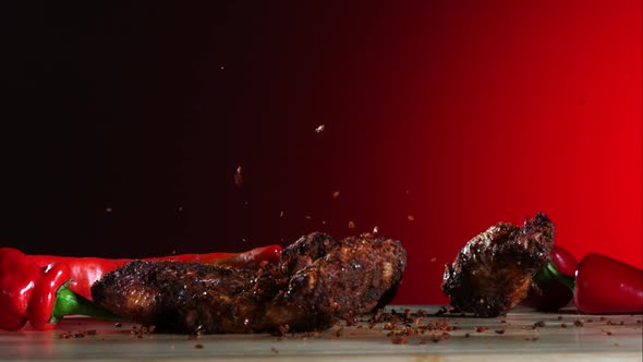 Smoked chicken wings falling and bouncing in ultra slow motion 1500fps - CHICKEN WINGS PHANTOM 031 alt