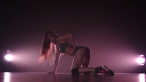 Slow Motion. Woman Sexy Shakes Buttocks Standing on Her Knees alt