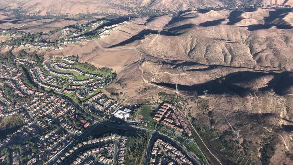 Aerial Video of the Santa Ana Mountain and homes in Southern Californaia . alt