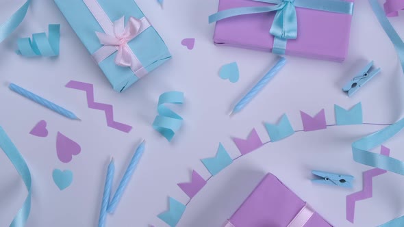 Rotating White Background with Candles Gift Boxes Serpentine and Holiday Decorations in Blue and alt