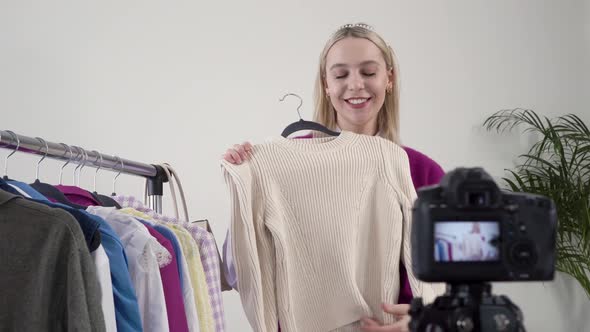 Woman Stylist Shows and Talks About Handmade Clothes in Front of the Camera