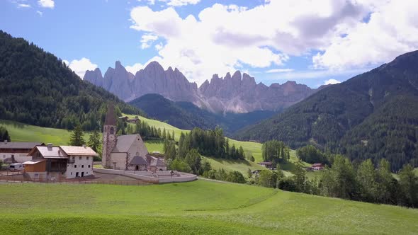 Aerial travel drone view of South Tyrol, Italy and the Dolomites mountains. alt
